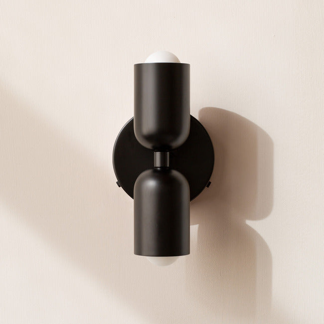 Modern two-light LED cylinder wall sconce with round backplate