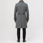 Men's long double-breasted trench coat with notched lapels and cuff tabs