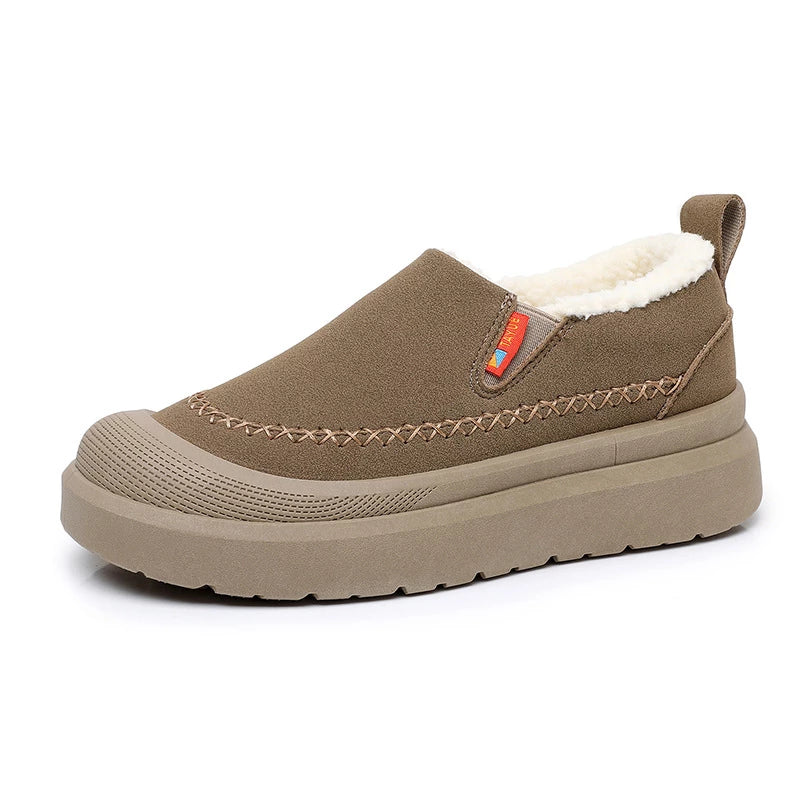 Women's slip-on shoes with plush lining, rounded toe, and layered sole