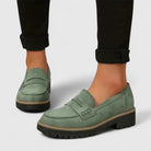 Women's slip-on orthopaedic loafers with vamp strap, stitched toe and lug sole