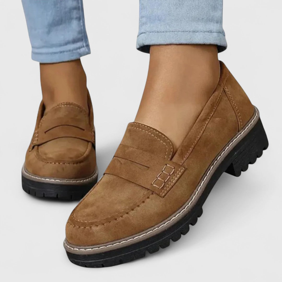 Women's slip-on orthopaedic loafers with vamp strap, stitched toe and lug sole