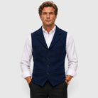 Men's herringbone vest with lapels, button front and welt-style pockets