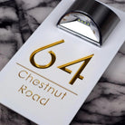 Personalized rectangular house number plaque with raised metallic lettering