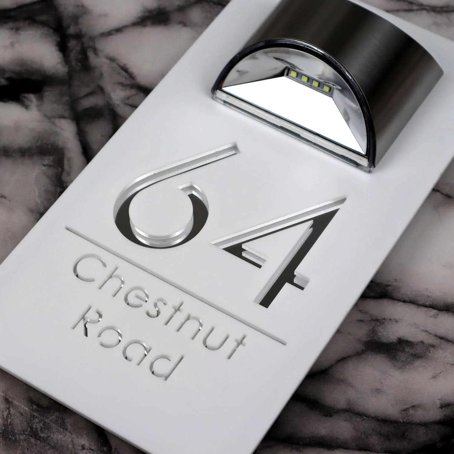 Personalized rectangular house number plaque with raised metallic lettering