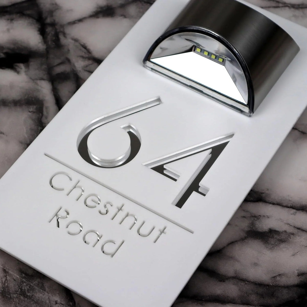 Personalized rectangular house number plaque with raised metallic lettering