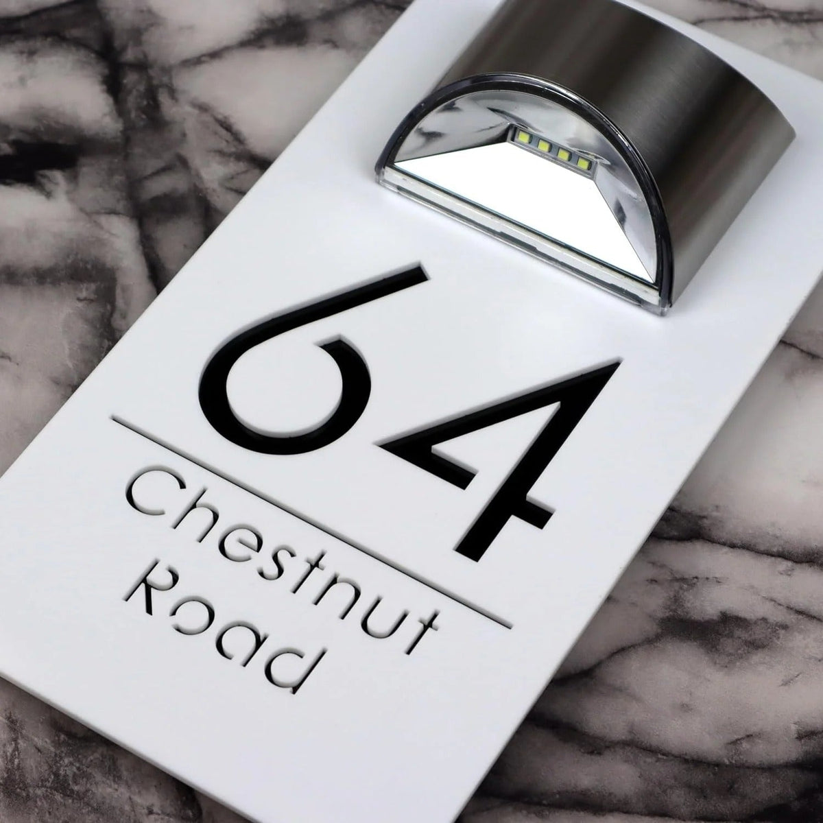 Personalized rectangular house number plaque with raised metallic lettering